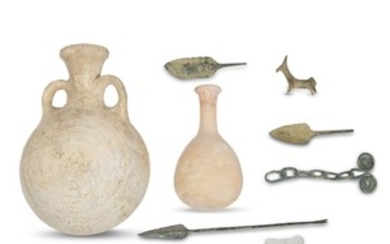 A collection of Persian Bronze Age artifacts circa late...
