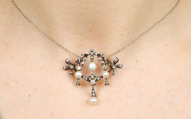 An early 20th century silver and gold, pearl and diamond necklace.