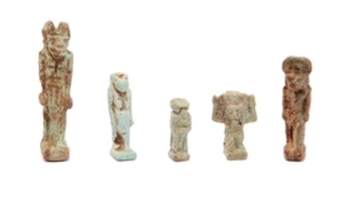 A GROUP OF EGYPTIAN GLAZED COMPOSITION AMULETS Including...