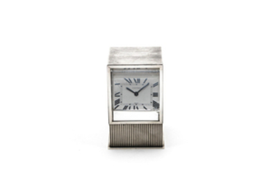 A late 20th century silver 'Prisma' mystery desk timepiece