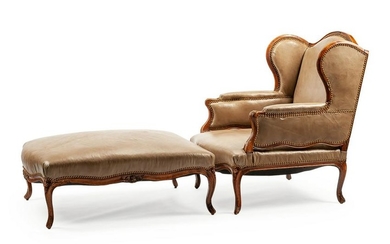 A Louis XV Leather Upholstered Carved Walnut Duchesse