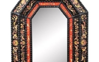 An Octagonal Cushion Framed Ebonized Mirror Inset
