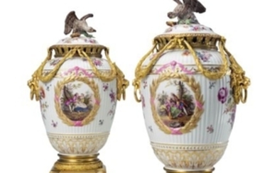 A PAIR OF ORMOLU-MOUNTED CONTINENTAL PORCELAIN RIBBED VASES AND COVERS, LATE 19TH/20TH CENTURY, TRACE OF BLUE MARK TO ONE, POSSIBLY BERLIN, IMPRESSED 4 TO COVERS AND BASES, THE BASES ALSO WITH CYPHERS