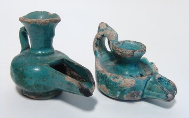 A pair of Persian/Islamic glazed lamps
