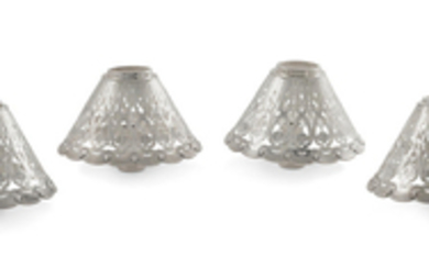 A set of four American sterling silver pierced candle shades
