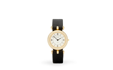 Van Cleef & Arpels. An 18K gold and diamond lady's wristwatch