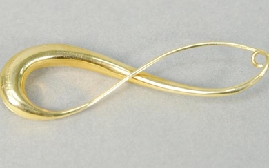 18 karat gold pin in the form of a figure eight, signed