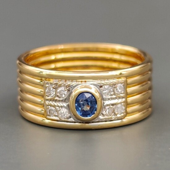 18 kt yellow gold ring with sapphire and diamonds