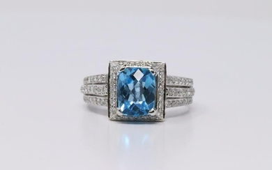 18Kt White Gold Blue Topaz Diamond Ring.