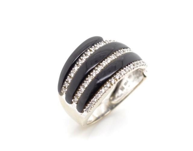 18ct white gold, diamond and onyx ring marked 750 18k. Appro...