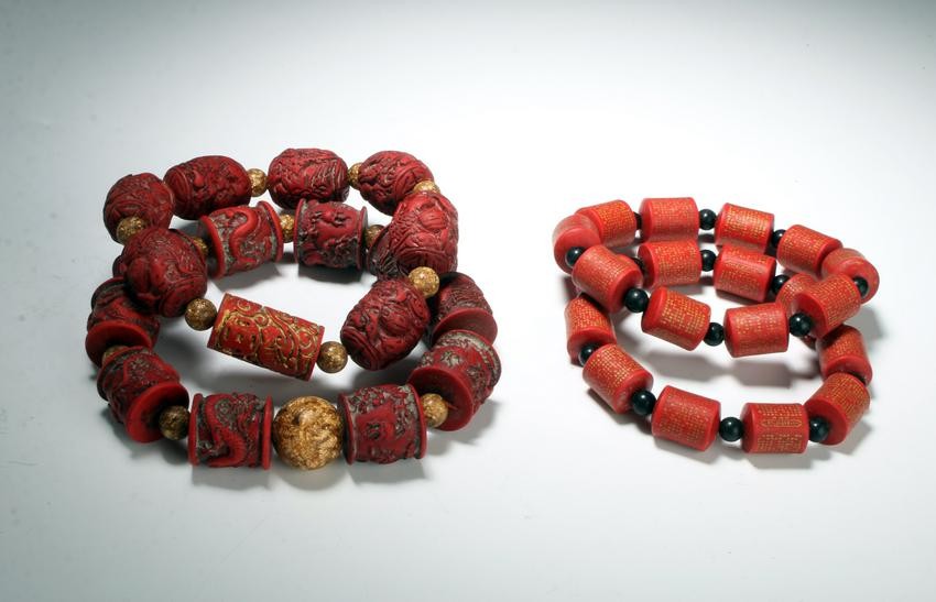 4 CHINESE CARVED BEAD BRACELETS