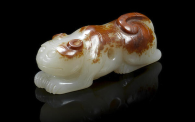 A pale green and russet jade tiger-form toggle
