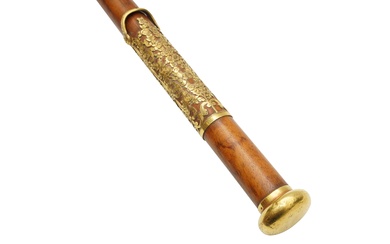 A 19TH CENTURY GOLD MOUNTED CANE