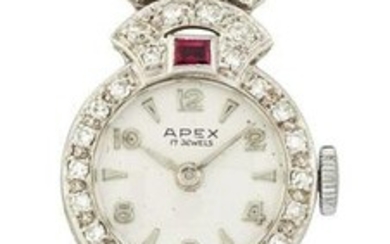 A 9CT RUBY AND DIAMOND COCKTAIL WATCH, the round white