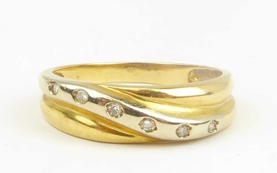 A 9ct yellow gold ring set single diagonal white gold...