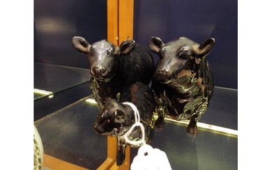A Beswick Aberdeen Angus bull, cow and calf
