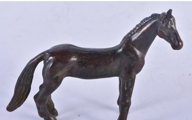 A Bronze Model of a Horse. 8.7cm x 7cm x 2.2 cm, weight 129...