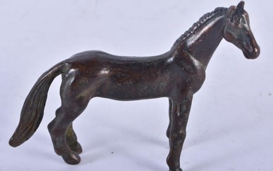 A Bronze Model of a Horse. 8.7cm x 7cm x 2.2 cm, weight 129g