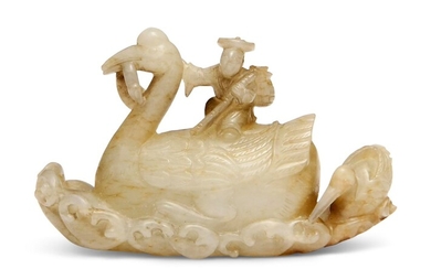A CELADON JADE 'CRANE AND RIDER' CARVING, LATE MING DYNASTY (1368-1644)