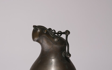 A CHINESE ARCHAISTIC BRONZE SILVER AND GOLD INLAID POURING VESSEL AND COVER