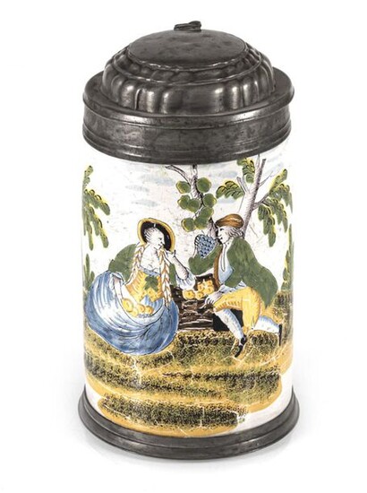 A CRAILSHEIM "YELLOW FAMILY" FAIENCE TANKARD, painted with a couple in a landscape C. 1770/80. Pewter mounts. Cracks. H. 17/20 cm