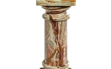 A Carved Onyx Pedestal