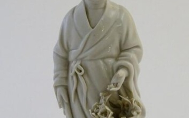 A Chinese blanc de chine depicting the Daoist Immortal