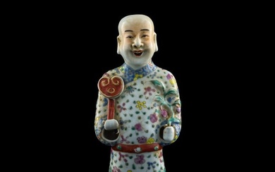 A Chinese famille rose boy-form incense holder, early 19th century