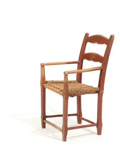 A Danish 19th century red painted armchair, seat suspended with woven sea grass.