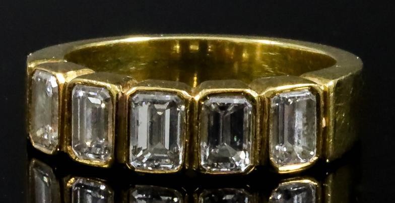 A Five Stone Diamond Ring, Modern, in gold coloured...