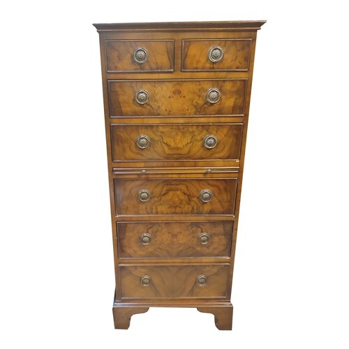 A GEORGIAN STYLE WALNUT PEDESTAL CHEST, of two short above f...