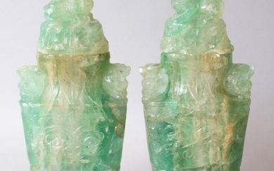 A GOOD PAIR OF CHINESE CARVED JADE LIDDED URNS, carved