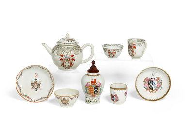 A GROUP OF EIGHT CHINESE EXPORT PORCELAIN ARMORIAL TEA AND...