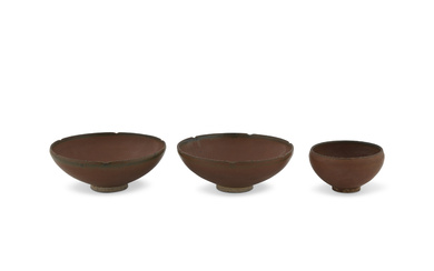 A GROUP OF THREE PERSIMMON-GLAZED BOWLS NORTHERN SONG-JIN DYNASTY (960-1234)