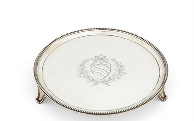 A George III silver circular salver by Robert Jones I