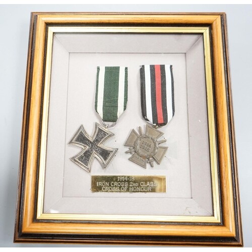 A German WWII Mother's Cross, rare unfinished, framed WWI Ir...