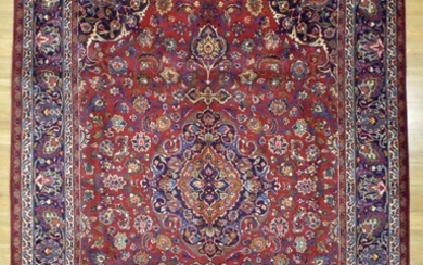 A HANDKNOTTED PURE WOOL ROOM SIZE PERSIAN KASHAN RUG