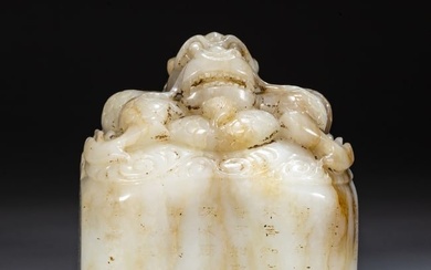 A HETIAN WHITE JADE SEAL, CARVED DRAGON DESIGN.