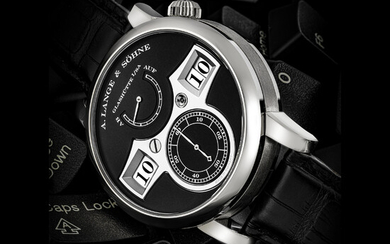 A. LANGE & SÖHNE. AN 18K WHITE GOLD WRISTWATCH WITH DIGITAL TIME DISPLAY AND POWER RESERVE ZEITWERK MODEL, REF. 140.029, CIRCA 2010