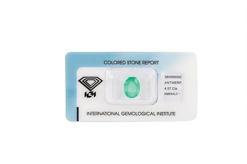 A LOOSE EMERALD in a sealed IGI packet, with an IGI report s...