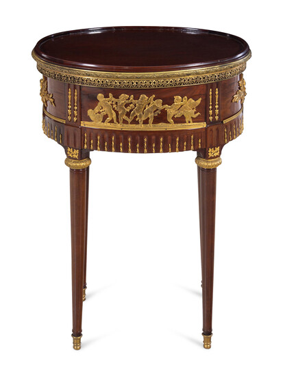A Louis XVI Style Gilt Metal Mounted Mahogany Tray-Top Side Table