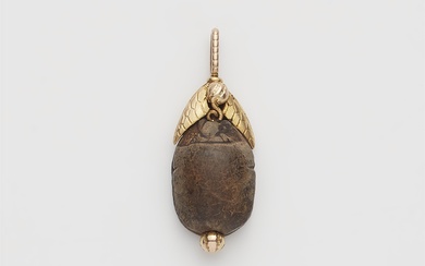 A Neoclassical 14k gold and Ancient Egyptian steatite scarab pendant.