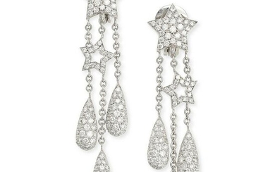 A PAIR OF DIAMOND STAR DROP EARRINGS in 18ct white gold, each designed as a star suspending a