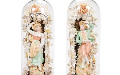 A PAIR OF GERMAN SLIP-MOULDED AND TINTED BISCUIT PORCELAIN MODELS OF A BOY AND COMPANION WEARING 18T