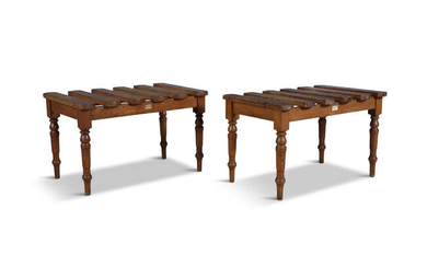 A PAIR OF OAK LUGGAGE STANDS, C.1900, retailed...