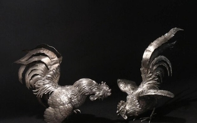 A PAIR OF PERUVIAN STERLING SILVER FIGHTING COCKS
