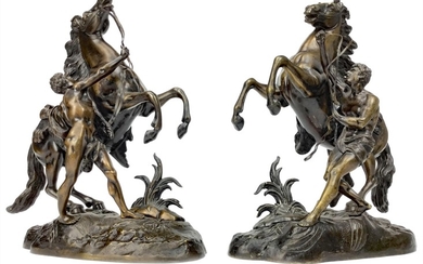 A PAIR OF VICTORIAN BRONZE MARLEY HORSES