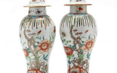 A Pair of Chinese Porcelain Covered Vases with Stands