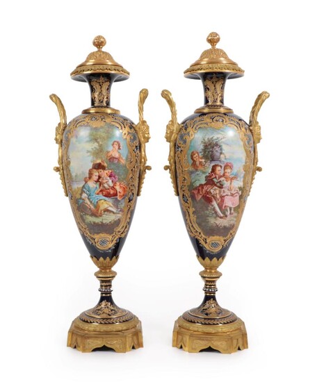 A Pair of Gilt Metal Mounted Sèvres Style Porcelain Vases and Covers, circa 1900, of baluster form