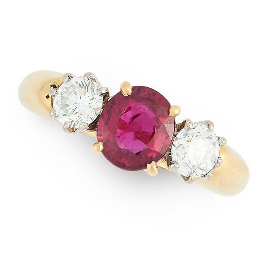 A RUBY AND DIAMOND THREE STONE RING in 18ct yellow